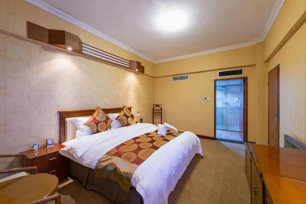 Bed in Yichang Three Gorges Project Hotel