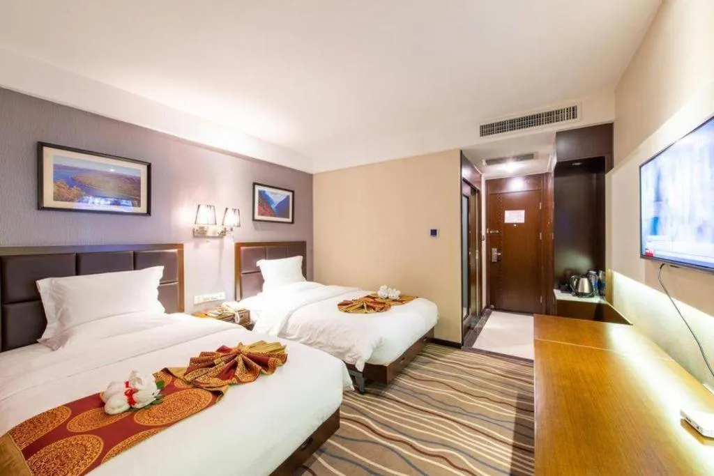 Bed in Yichang Three Gorges Project Hotel