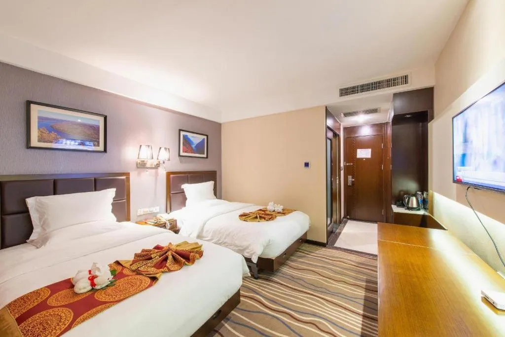 Bed in Yichang Three Gorges Project Hotel