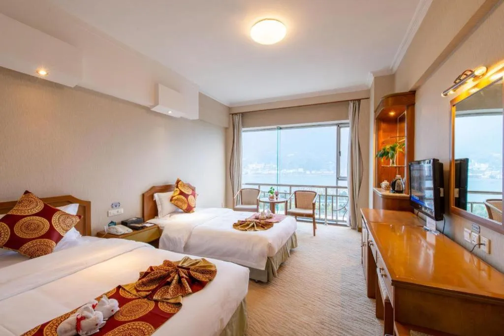 Bed in Yichang Three Gorges Project Hotel