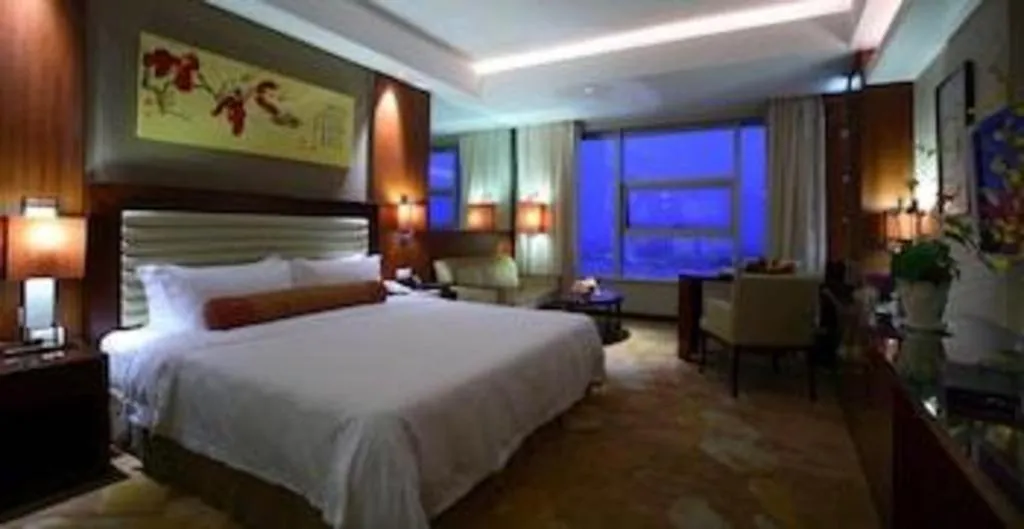 Bed in Fuyang International Trade Centre Hotel