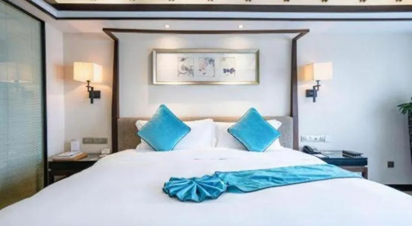 Bed in Fuyang International Trade Centre Hotel