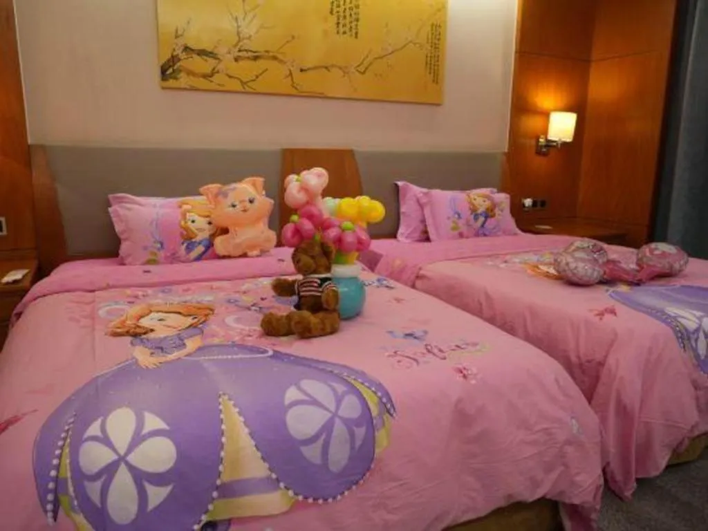 Bed in Fuyang International Trade Centre Hotel