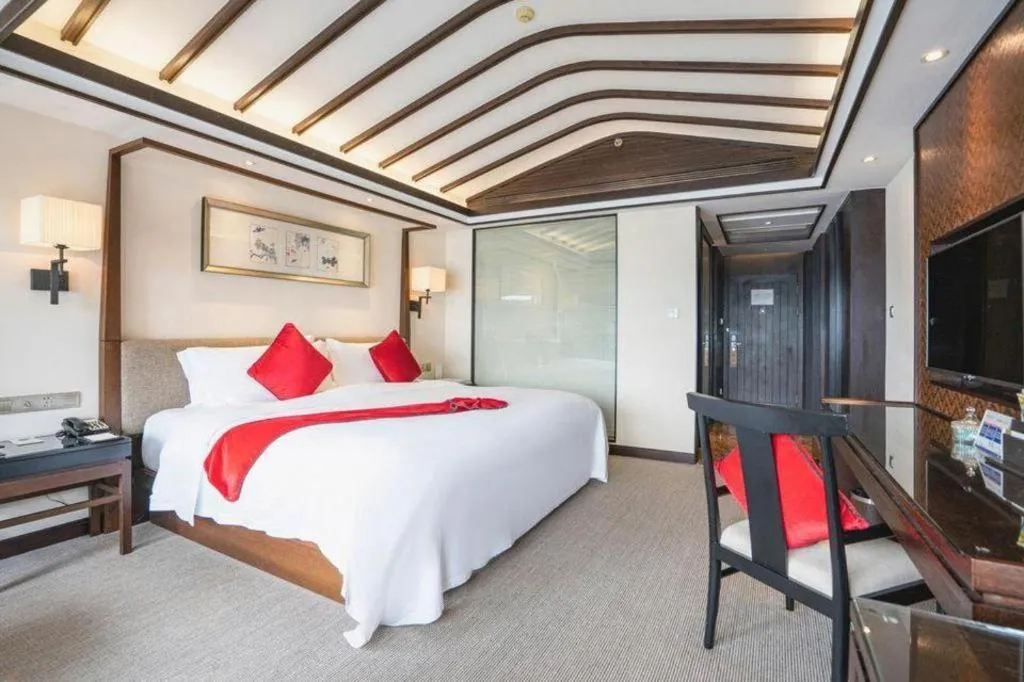 Bed in Fuyang International Trade Centre Hotel