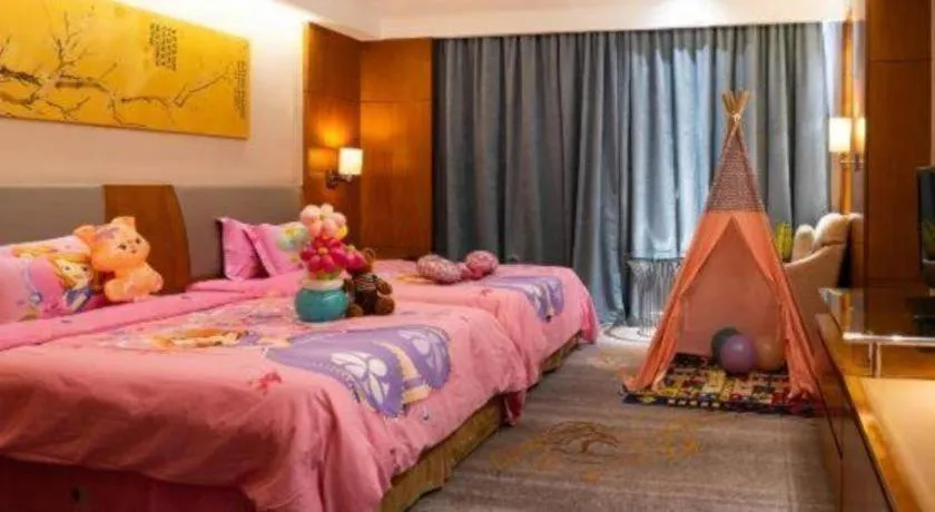 Bed in Fuyang International Trade Centre Hotel