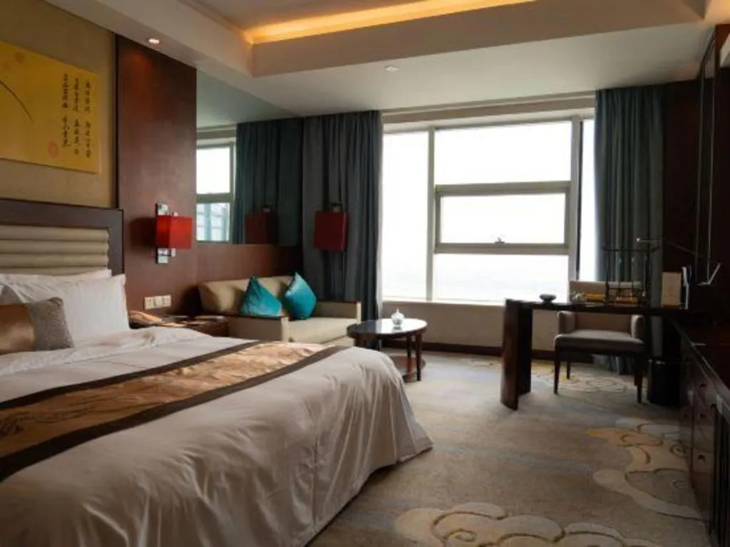 Bed in Fuyang International Trade Centre Hotel