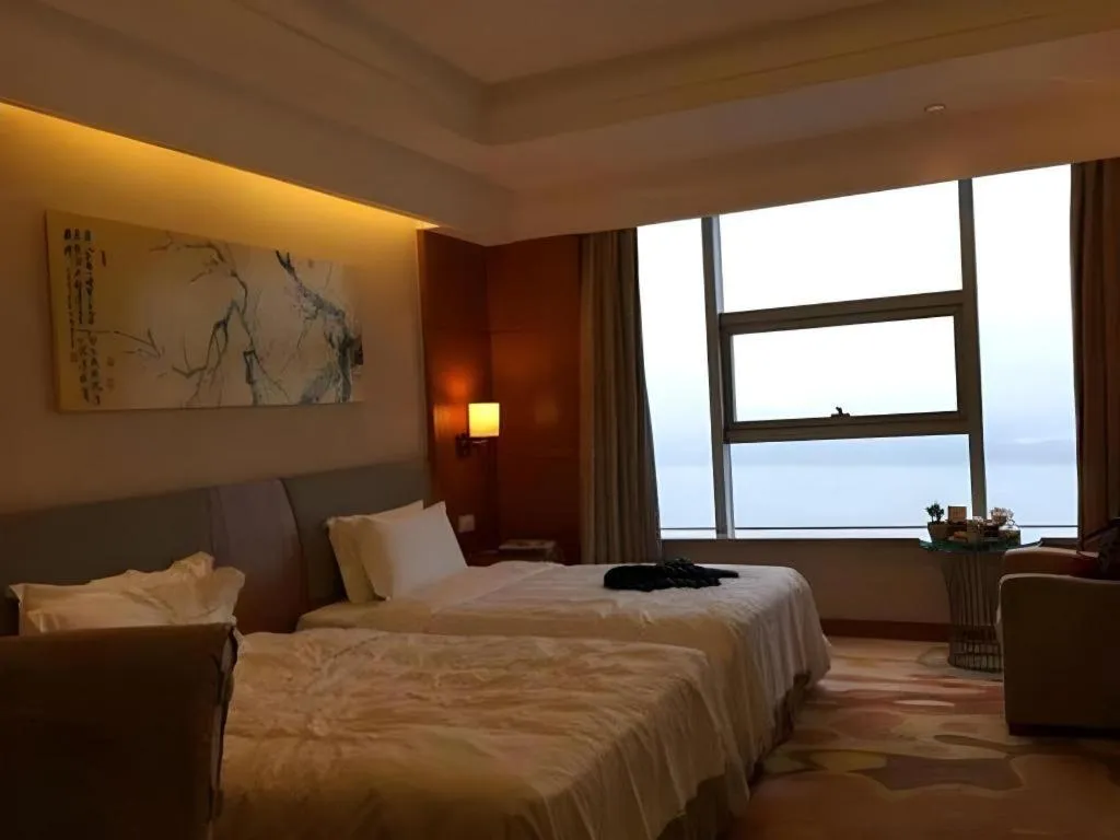 Bed in Fuyang International Trade Centre Hotel