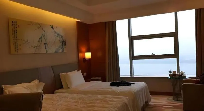 Bed in Fuyang International Trade Centre Hotel
