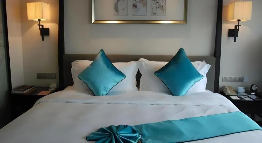 Bed in Fuyang International Trade Centre Hotel