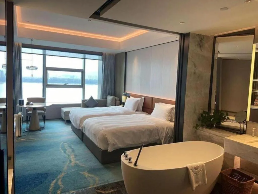 Bed in Fuyang International Trade Centre Hotel
