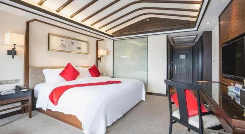 Bed in Fuyang International Trade Centre Hotel