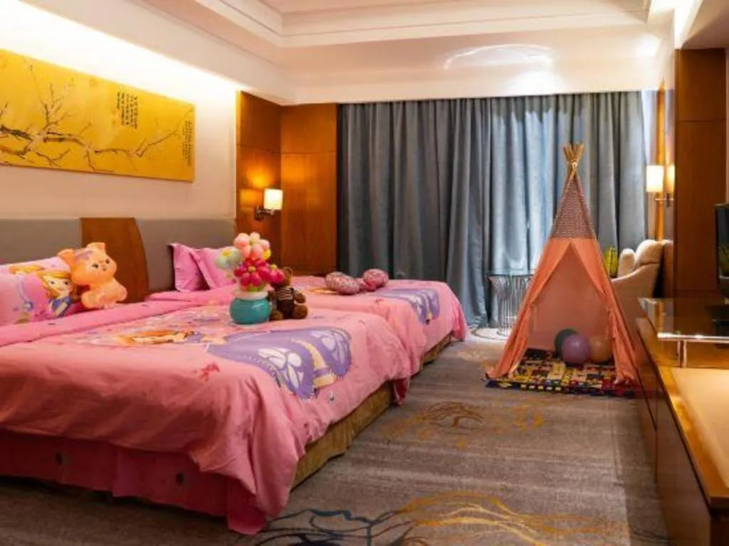 Bed in Fuyang International Trade Centre Hotel