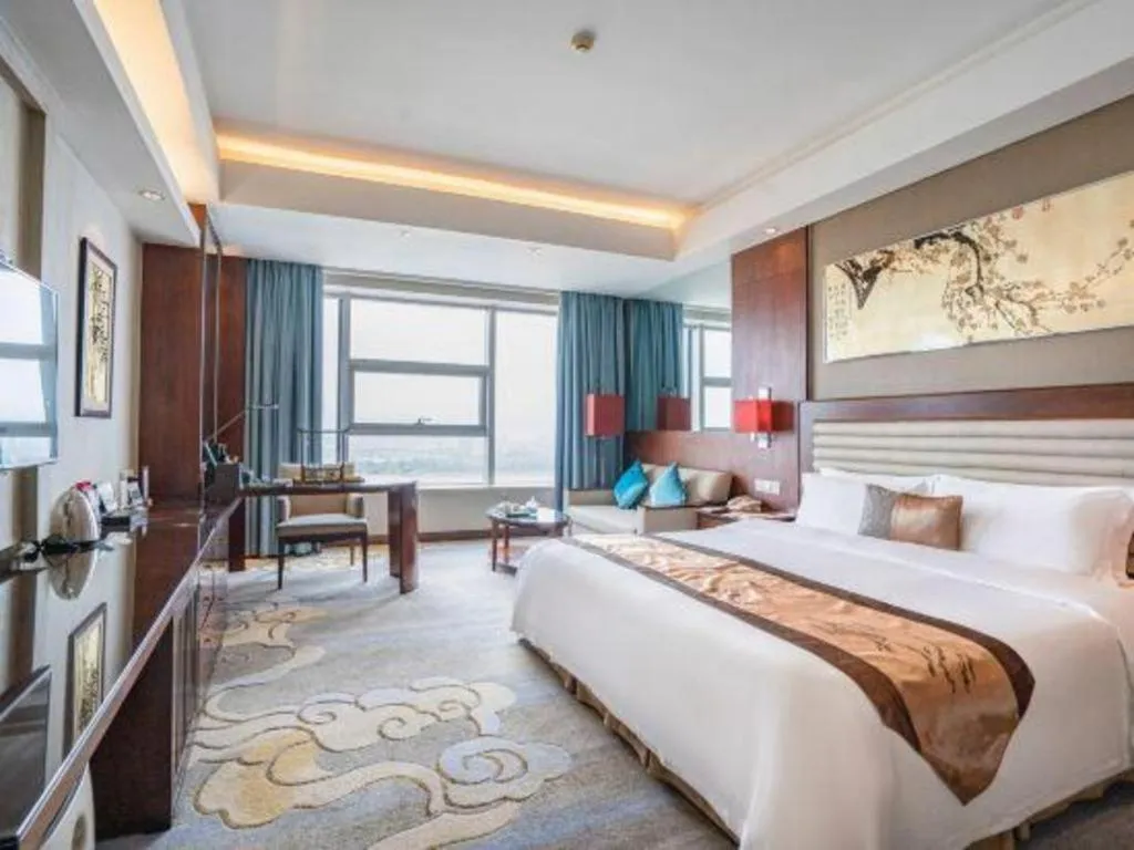 Bed in Fuyang International Trade Centre Hotel