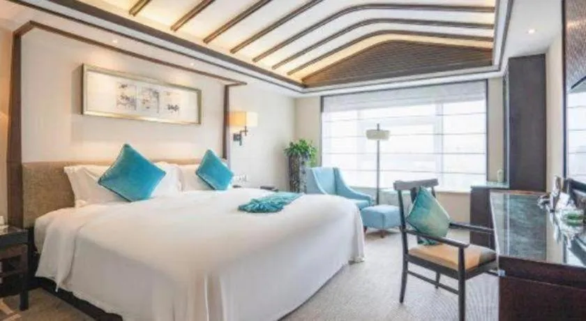 Bed in Fuyang International Trade Centre Hotel