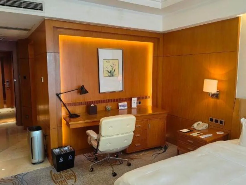 Bed in Fuyang International Trade Centre Hotel