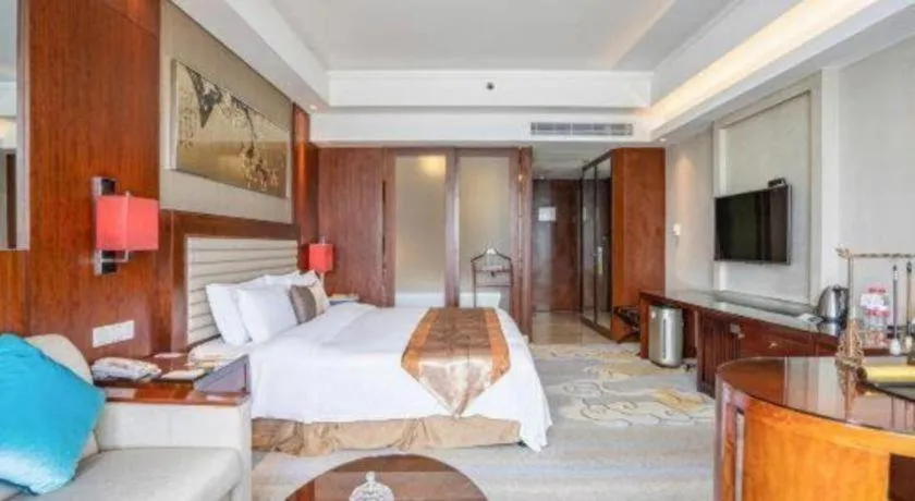 Bed in Fuyang International Trade Centre Hotel