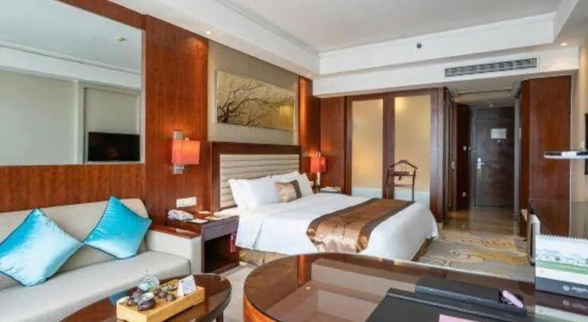 Bed in Fuyang International Trade Centre Hotel