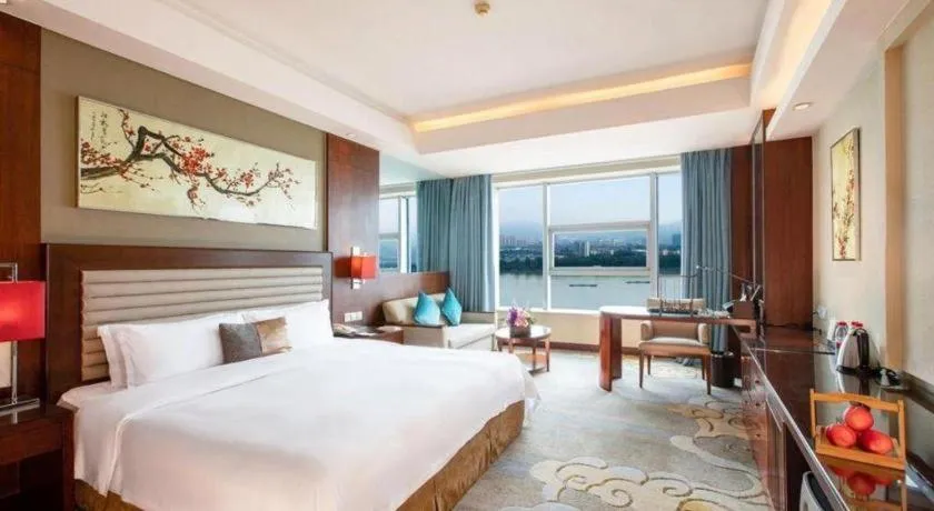 Bed in Fuyang International Trade Centre Hotel