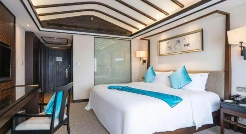 Bed in Fuyang International Trade Centre Hotel