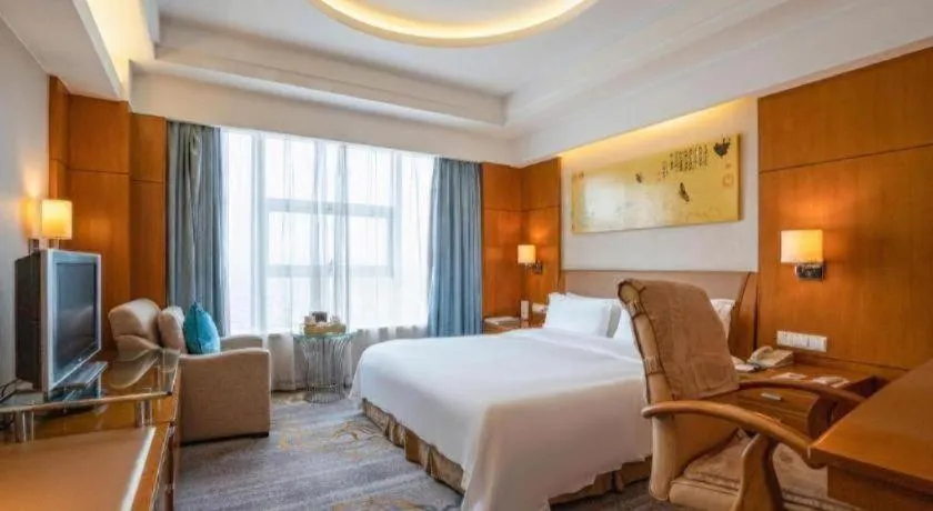 Bed in Fuyang International Trade Centre Hotel