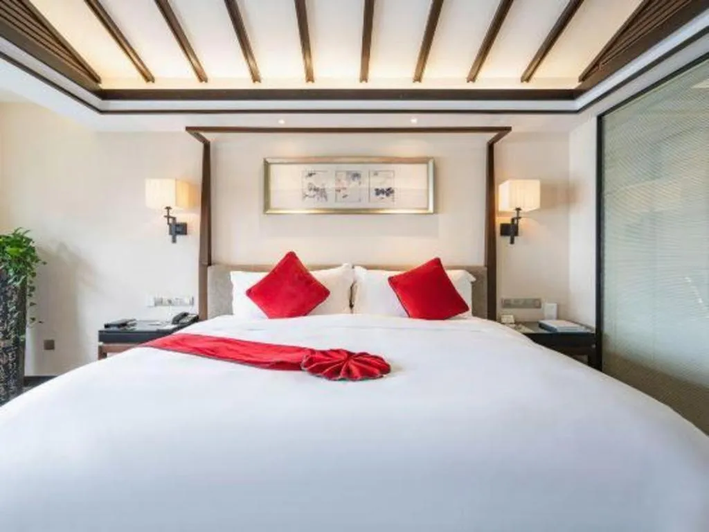 Bed in Fuyang International Trade Centre Hotel