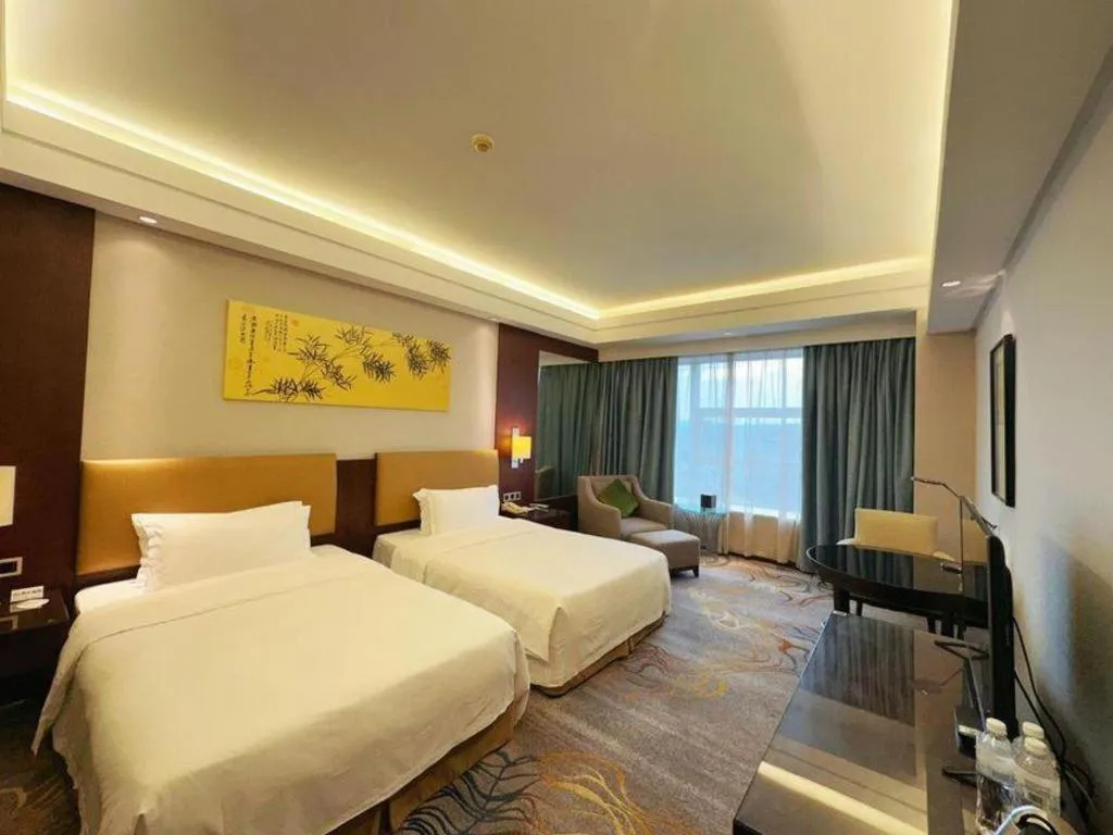 Bed in Fuyang International Trade Centre Hotel