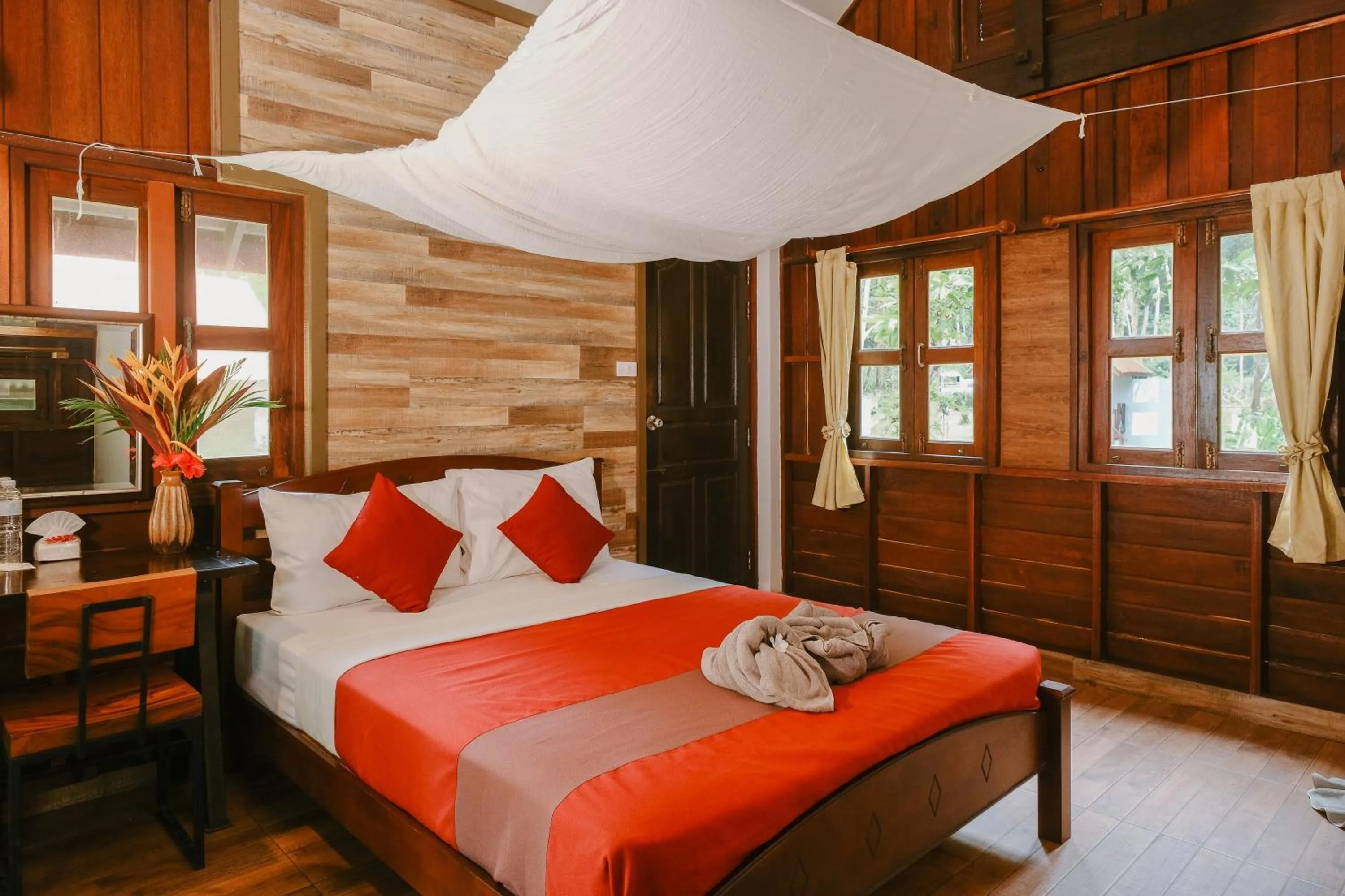 Bed in JOY Bungalow Resort and Restaurant