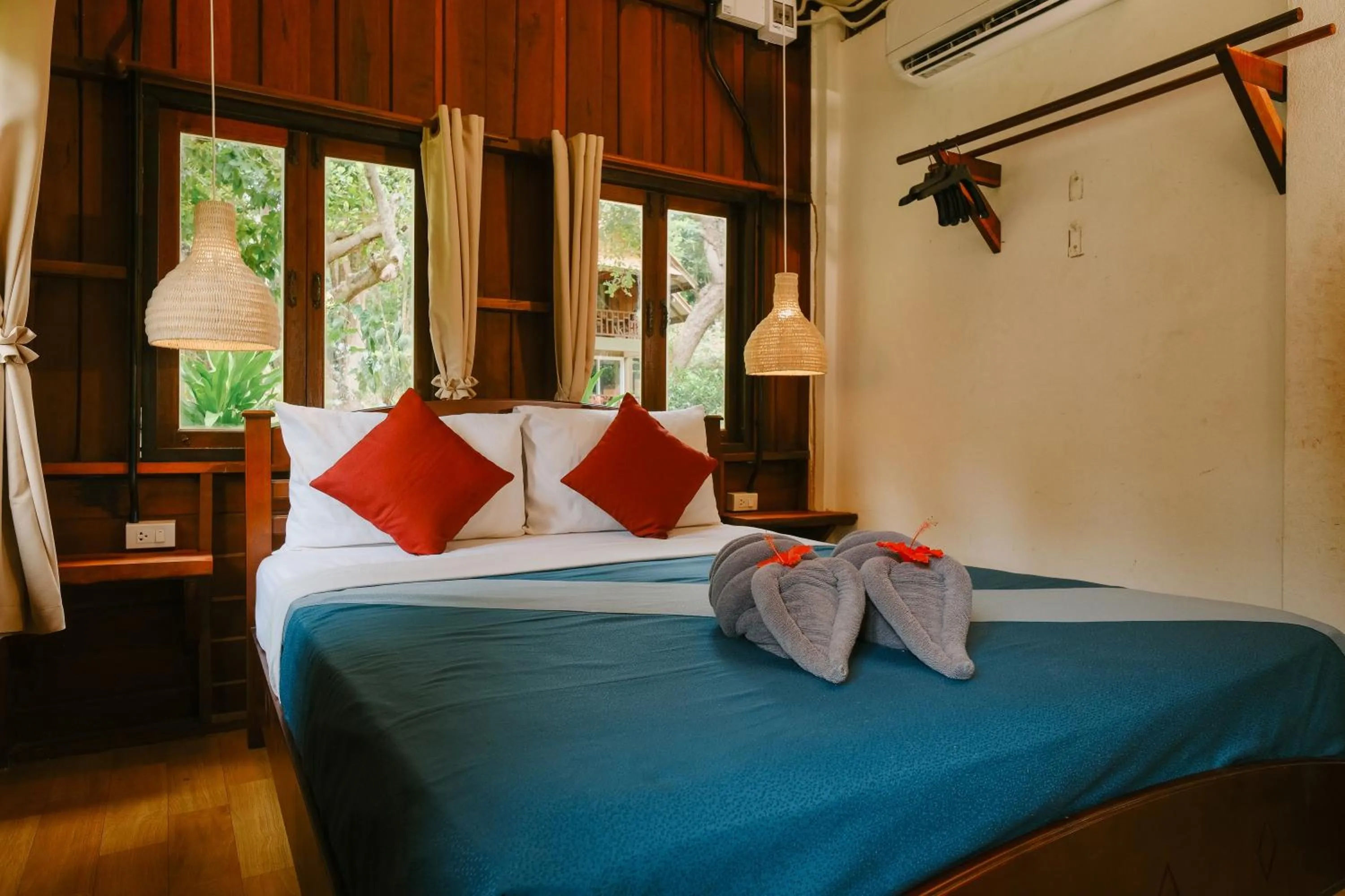 Bed in JOY Bungalow Resort and Restaurant