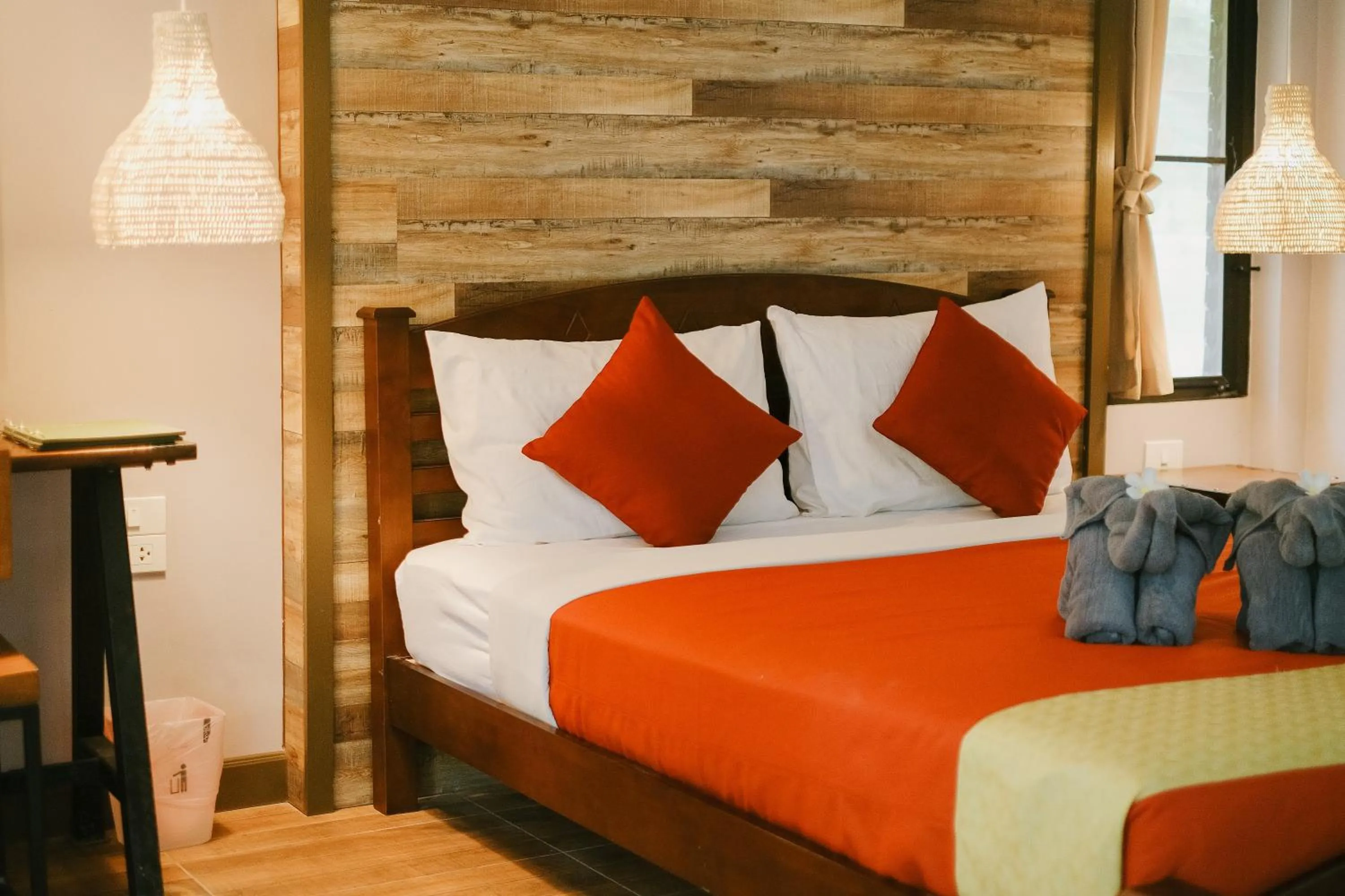 Bed in JOY Bungalow Resort and Restaurant