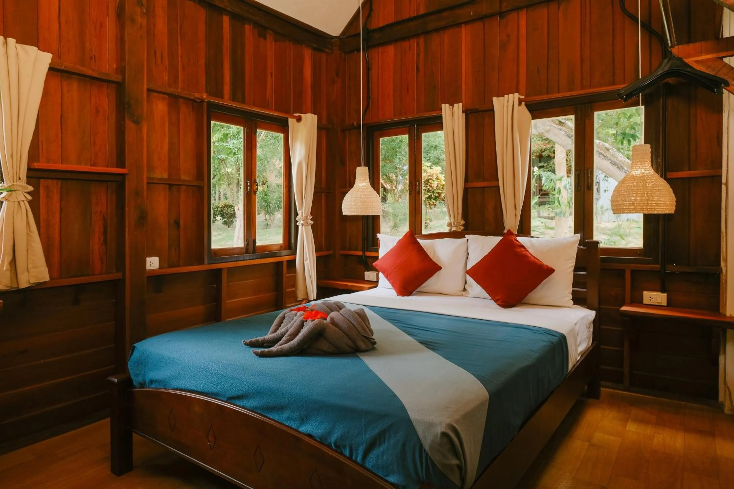 Bed in JOY Bungalow Resort and Restaurant