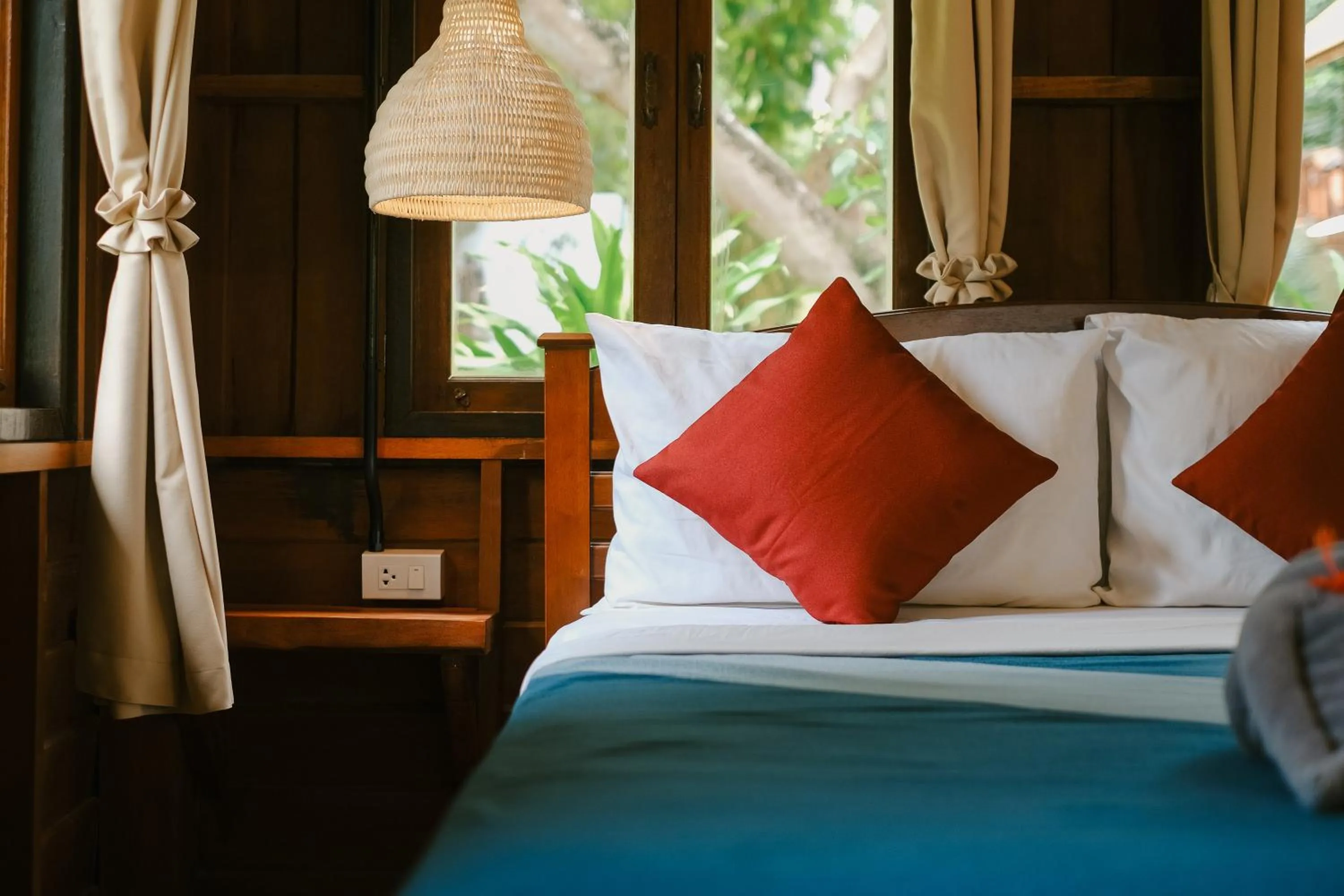 Bed in JOY Bungalow Resort and Restaurant