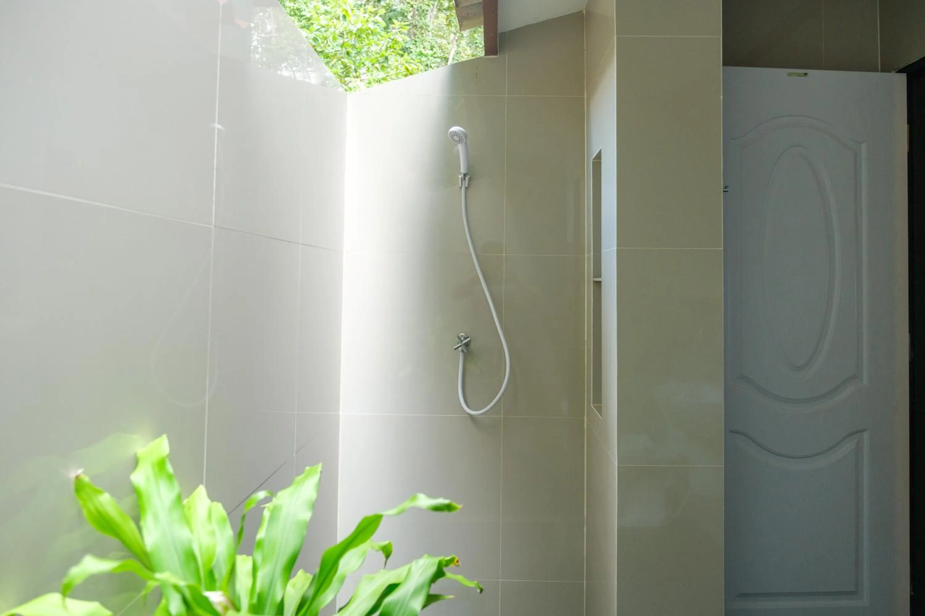 Shower in JOY Bungalow Resort and Restaurant