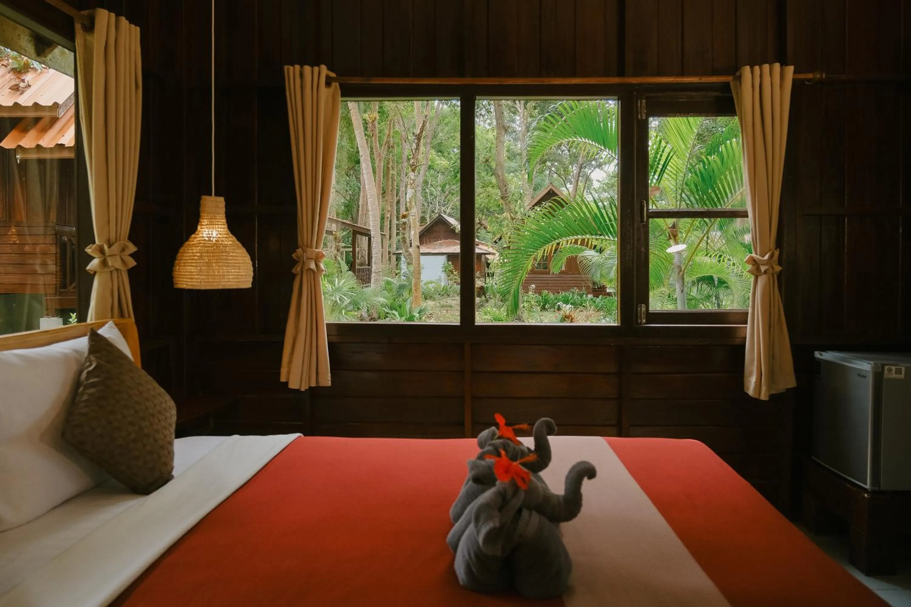 Bed in JOY Bungalow Resort and Restaurant