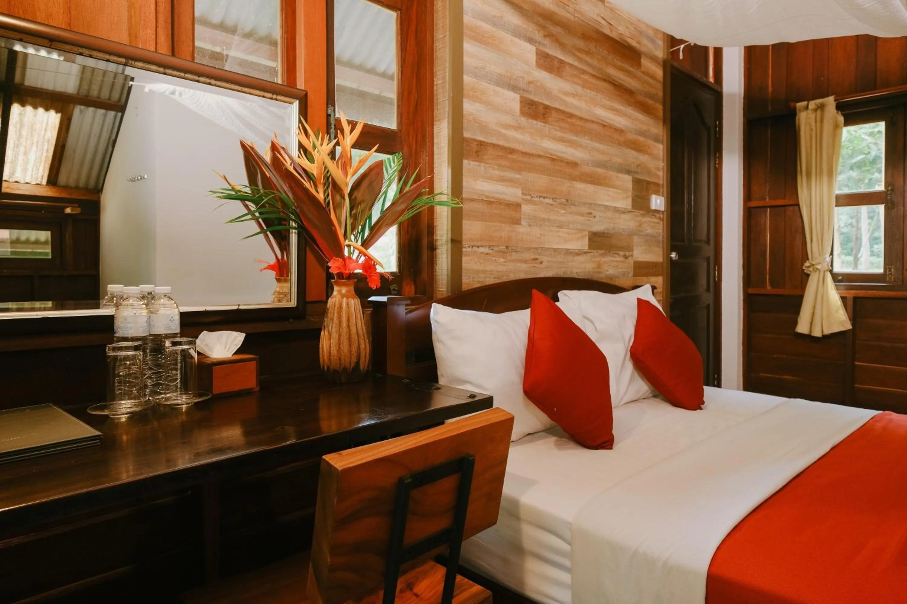 Bed in JOY Bungalow Resort and Restaurant