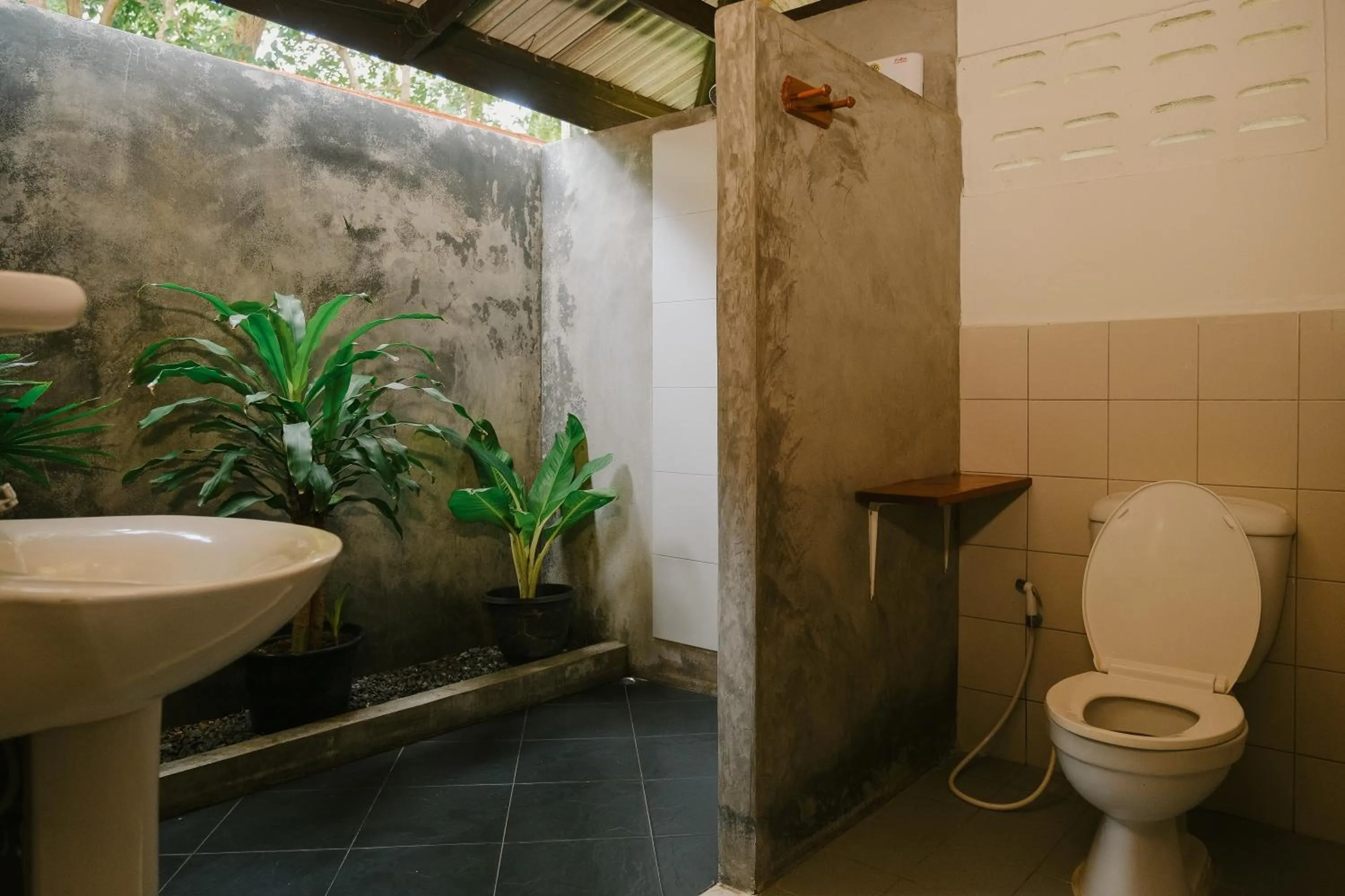 Shower in JOY Bungalow Resort and Restaurant