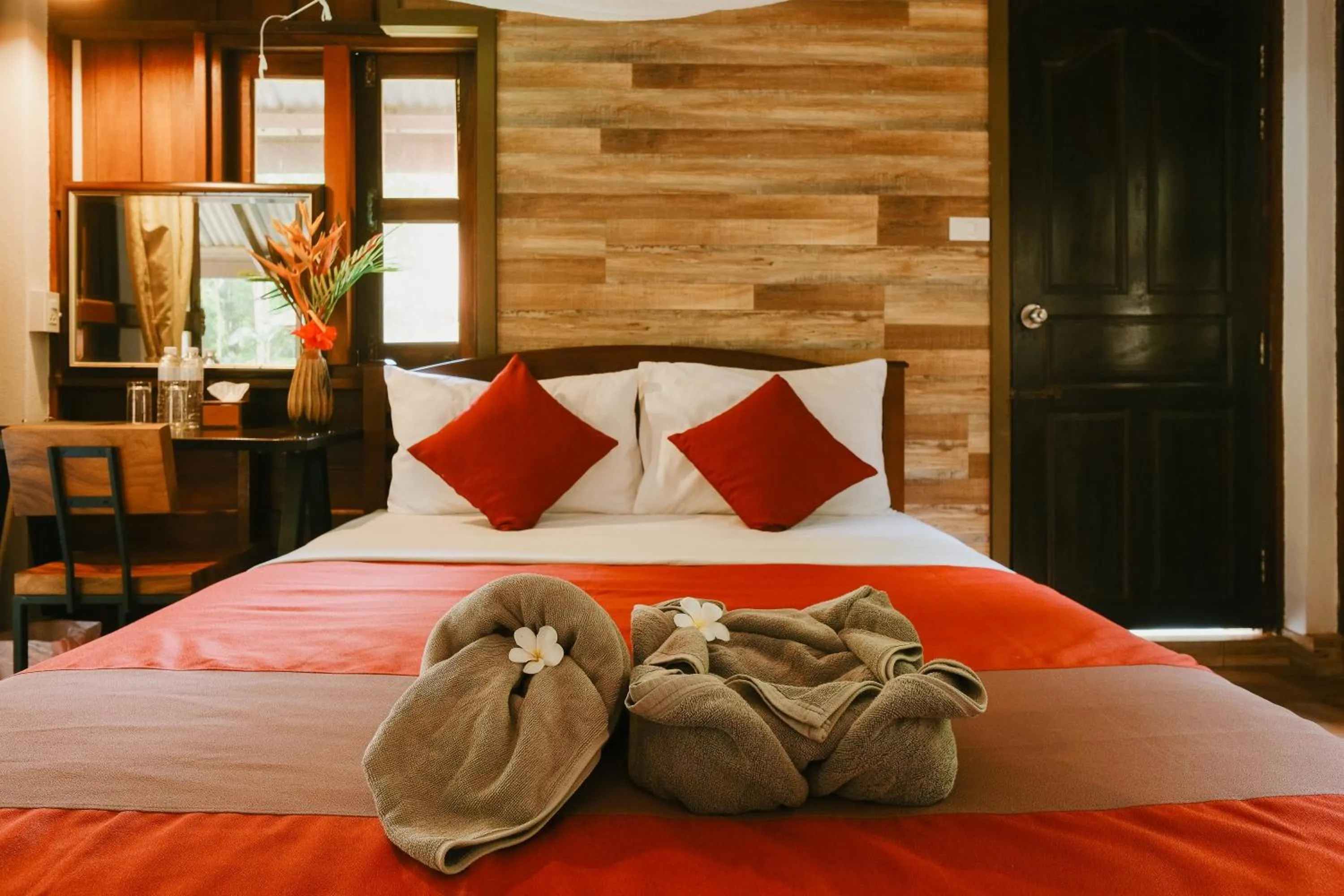 Bed in JOY Bungalow Resort and Restaurant
