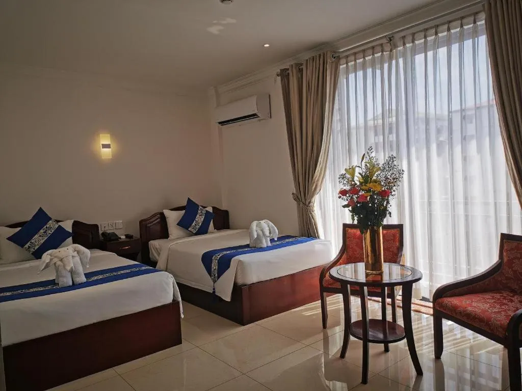 Bed in Jun Yue Hotel