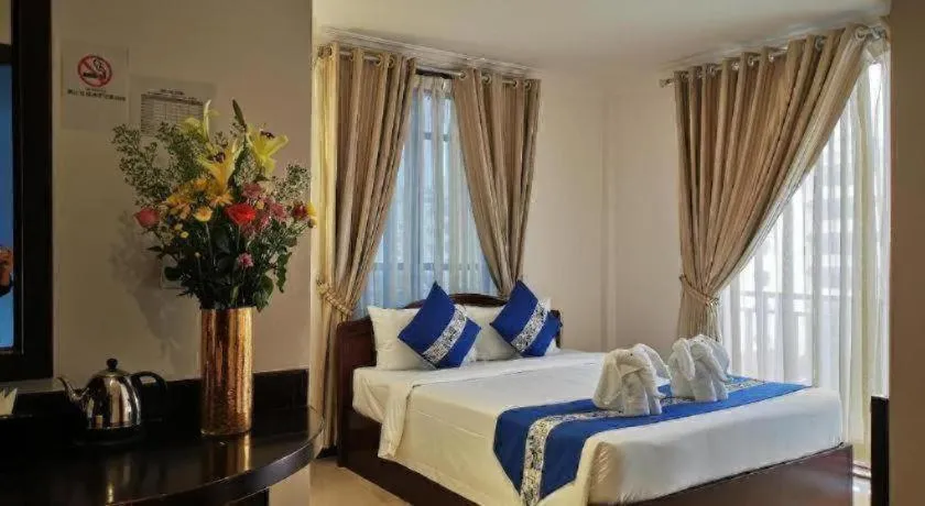 Bed in Jun Yue Hotel