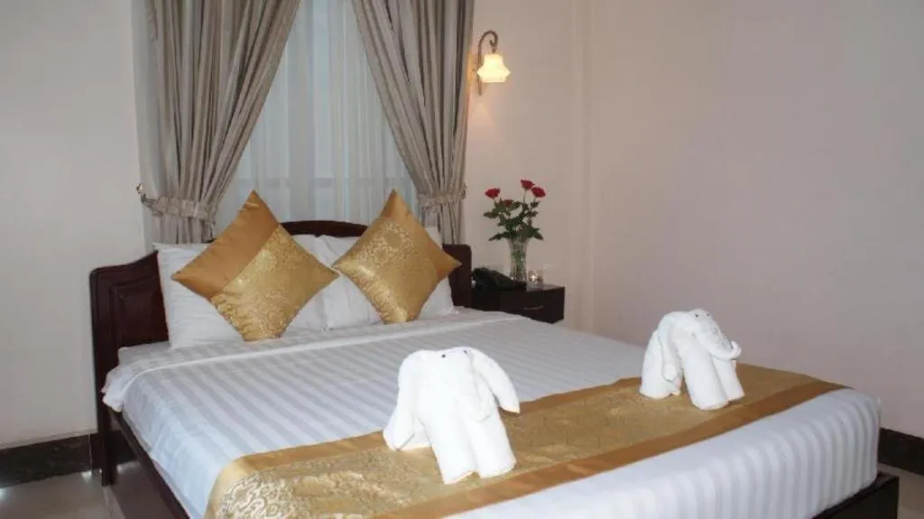 Bed in Jun Yue Hotel