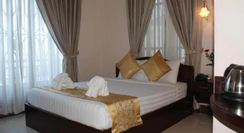 Bed in Jun Yue Hotel