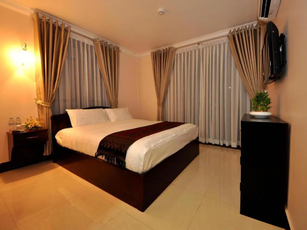 Bed in Jun Yue Hotel