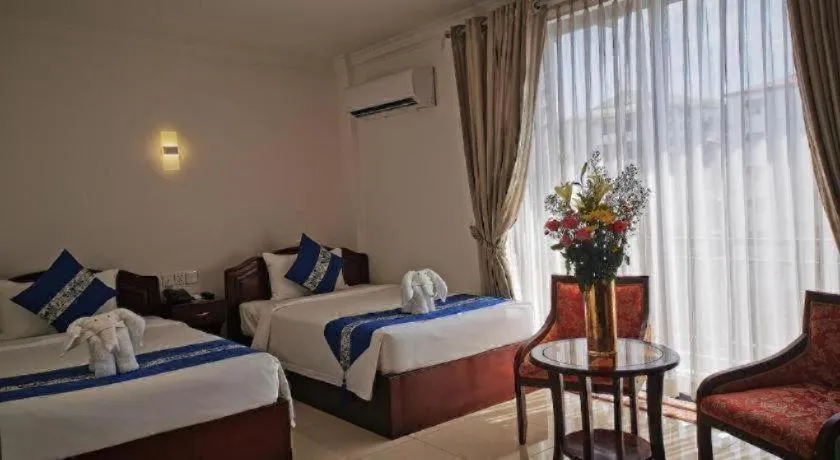 Bed in Jun Yue Hotel