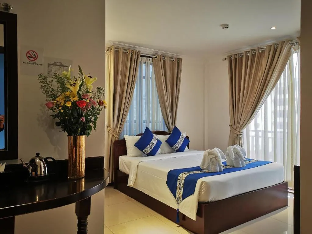 Bed in Jun Yue Hotel