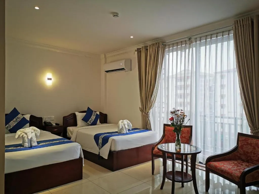 Bed in Jun Yue Hotel