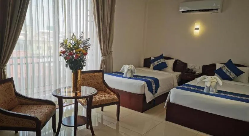 Bed in Jun Yue Hotel