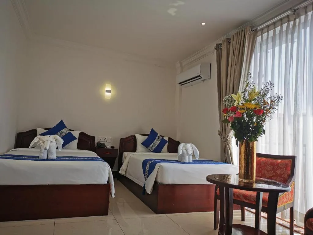 Bed in Jun Yue Hotel