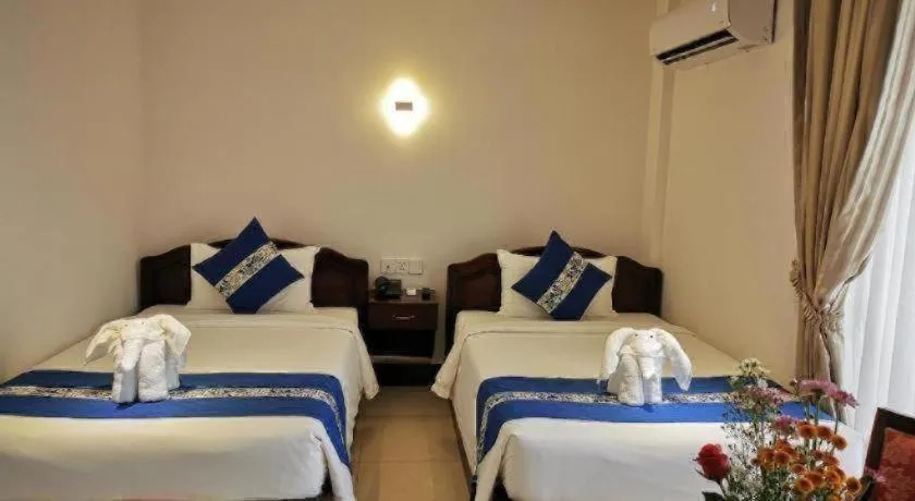 Bed in Jun Yue Hotel