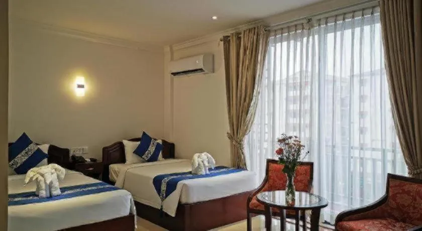 Bed in Jun Yue Hotel