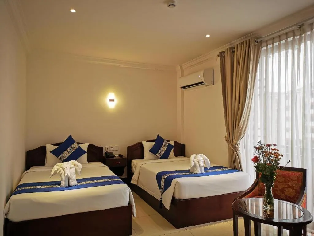 Bed in Jun Yue Hotel