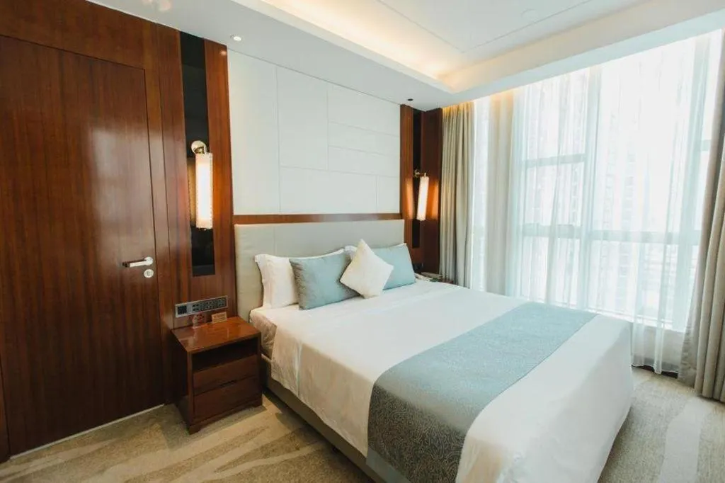 Bed in Grand Soluxe Zhongyou Hotel Shenzhen